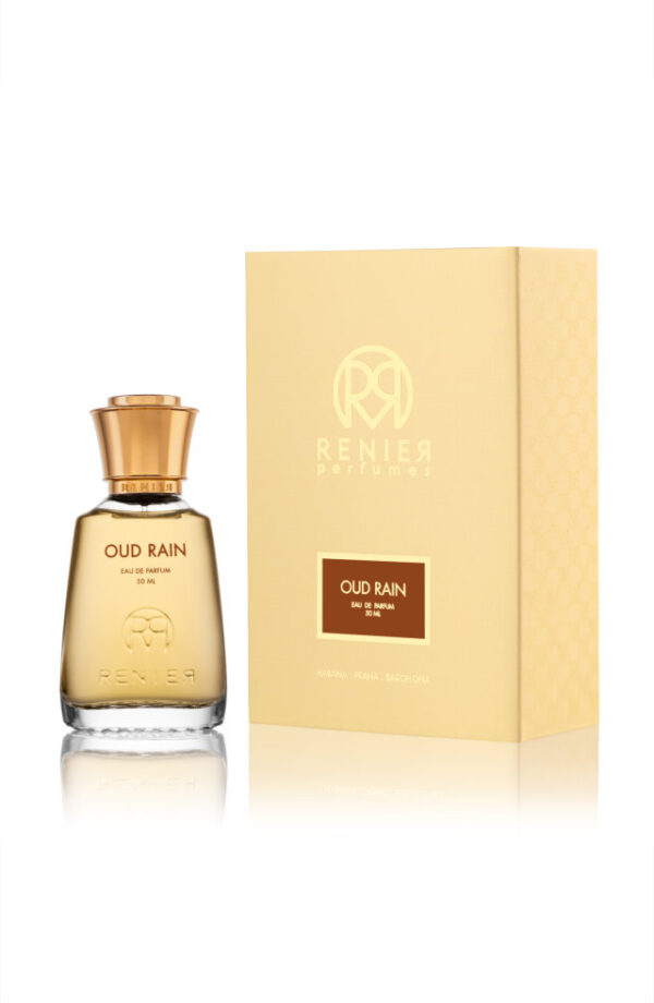 Perfume elegante, líquido dorado. Caja Dorada, con rectándolo marrón y Oud Rain dentro en dorado.